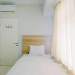 Modern and Comfortable 2BR Springlake Summarecon Bekasi Apartment By Travelio